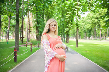 Pregnant woman in the park