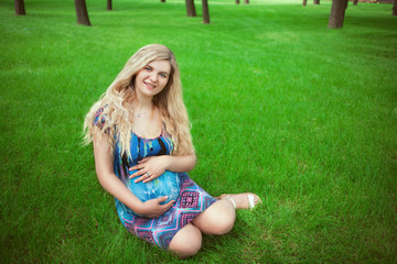 Pregnant woman in the park