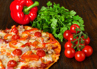 Delicious pizza with bacon and cherry tomatoes