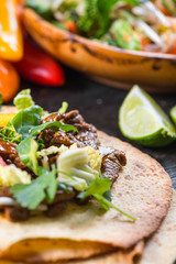 close view on mexina tacos with beef and vegetables