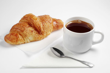 Croissant and coffee cup