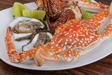 Spiny lobster, crab and oyster