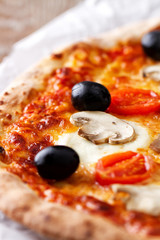 Pizza with olives and mushrooms
