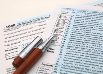 Fototapeta premium Income tax form and pen. Finance concept