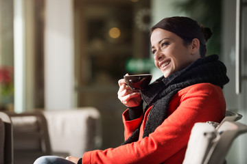 Woman relaxing at the cafe