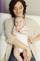 Fototapeta na wymiar Portrait of mother and baby