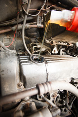 Motor oil, car engine close up