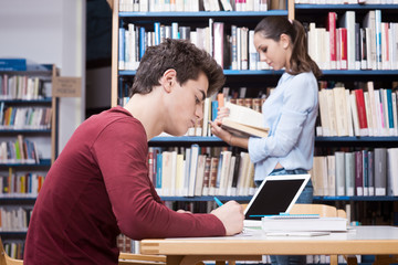 Student studying at the library