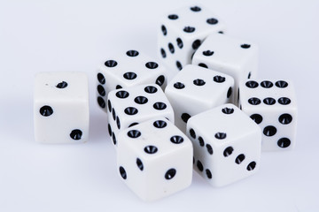 Dice scattered on white background