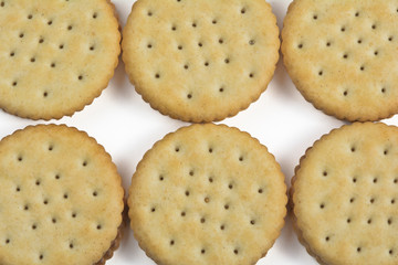 Round crackers lined up for background