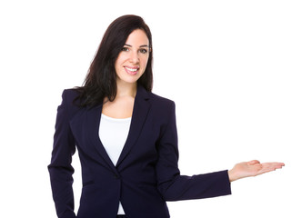 Businesswoman with hand presentation