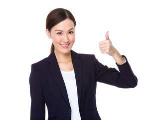 Businesswoman with finger thumb up