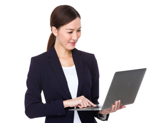 Businesswoman use of laptop