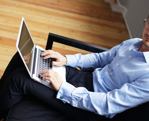 Handsome business man working with computer.