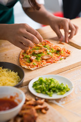 Obraz na płótnie Canvas Cooking pizza