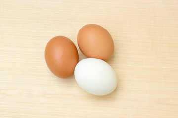 chicken egg and duck egg plywood board background