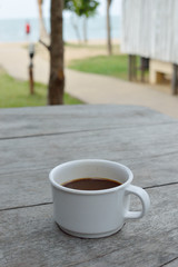 coffee white cup on wood background