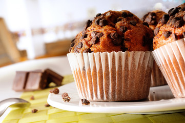 Muffins with chocolate chips on the table