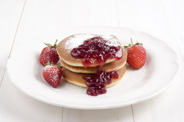 american pancake with strawberry jam