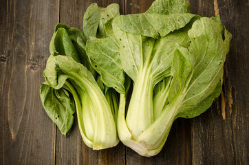 Chinese cabbage ( Bok choy) on wooden background