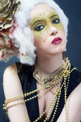 Portrait of young woman with creative make-up