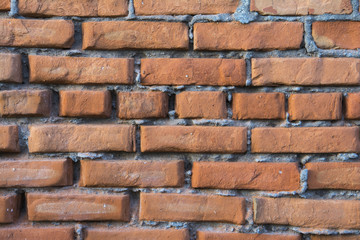 Old red painted brick wall
