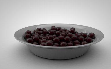 plate with cherries on a gray background