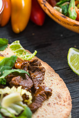 close view on mexina tacos with beef and vegetables