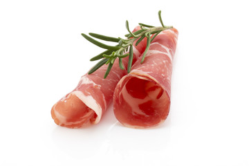 Dried pig meat slices. Delicatess.