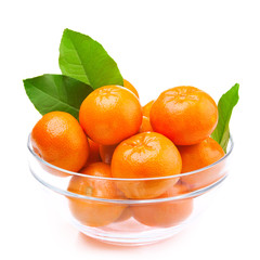 Tangerines in a glass bowl