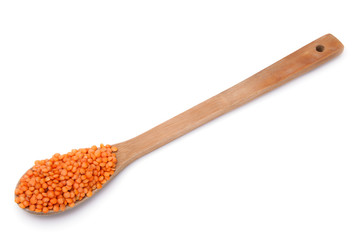 Lentils in a wooden spoon
