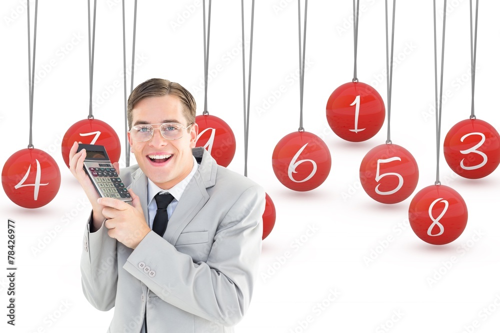 Poster Composite image of geeky smiling businessman holding calculator