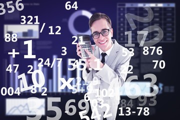 Composite image of geeky smiling businessman showing calculator
