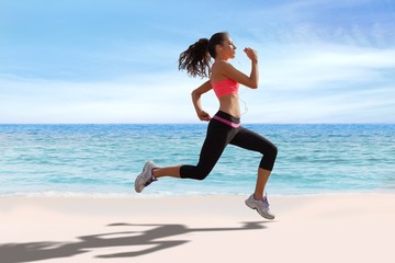 Fototapeta na wymiar Composite image of full length of healthy woman jogging