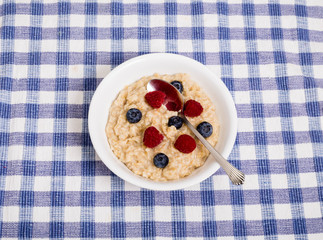 Oatmeal with Berries and Spoon