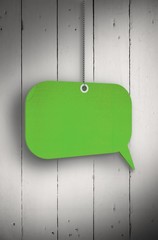 Composite image of speech bubble tag hanging