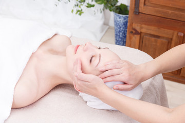 Obraz na płótnie Canvas エステ Face massage