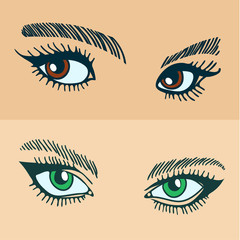 green and brown womens eyes.