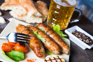 Grilled sausages and beer