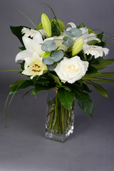 beautiful bouquet of white flowers with roses, lily and daisy