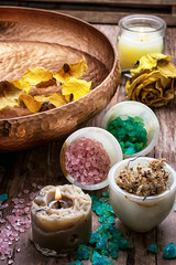 bronze bowl with water and accessories spa treatments