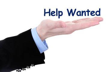Help Wanted phrase on businessman's hand isolated on white