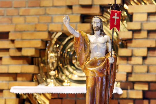 Wooden figure of Jesus resurrected, in the church during Easter