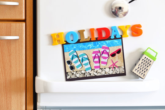 Refrigerators door with text Holidays and Photo By The Pool