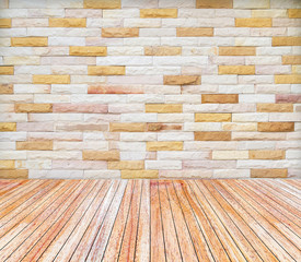 Backdrop brick wall and wood slabs arranged in perspective.