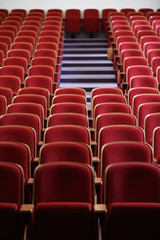 Empty theatre with red seats