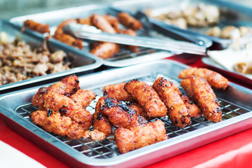 Grilled sausage in market