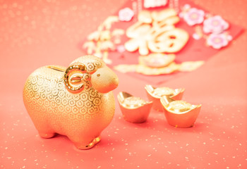 Ceramic goat souvenir on red paper