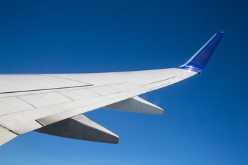 Aerial view of sky from aircraft window.