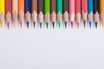 Border of colorful pencil crayons
